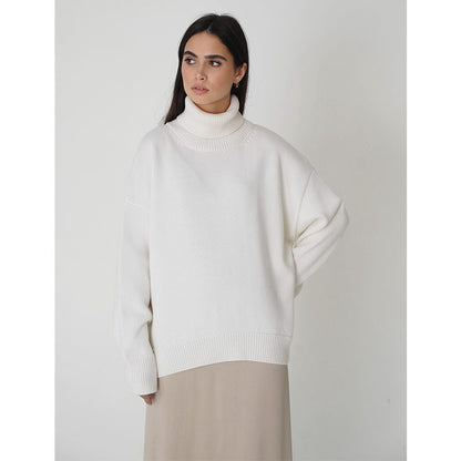Pull col roulé uni féminin, à la mode et tout assorti.